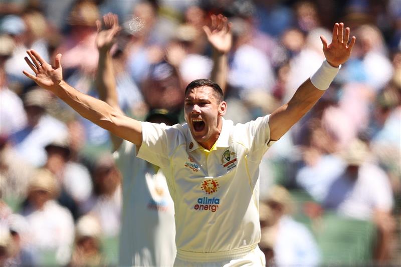 MELBOURNE, AUSTRALIA - DECEMBER 28: Scott Boland of Australia appeals successfully for LBW to dismiss Jonny Bairstow of England during day three of the Third Test match in the Ashes series between Australia and England at Melbourne Cricket Ground on December 28, 2021 in Melbourne, Australia. (Photo by Robert Cianflone/Getty Images)