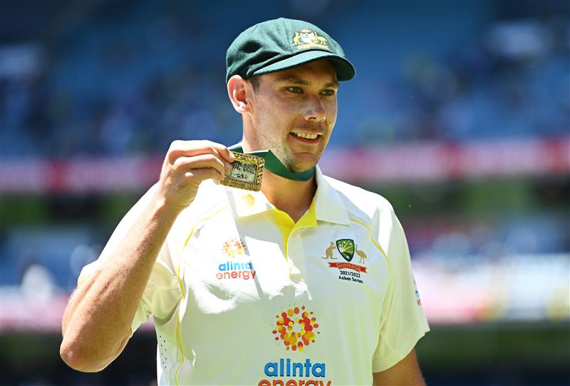 MELBOURNE, AUSTRALIA - DECEMBER 28: Scott Boland of Australia poses with the Johnny Muller medal after winning and retaining the Ashes on day three of the Third Test match in the Ashes series between Australia and England at Melbourne Cricket Ground on December 28, 2021 in Melbourne, Australia. (Photo by Quinn Rooney/Getty Images)