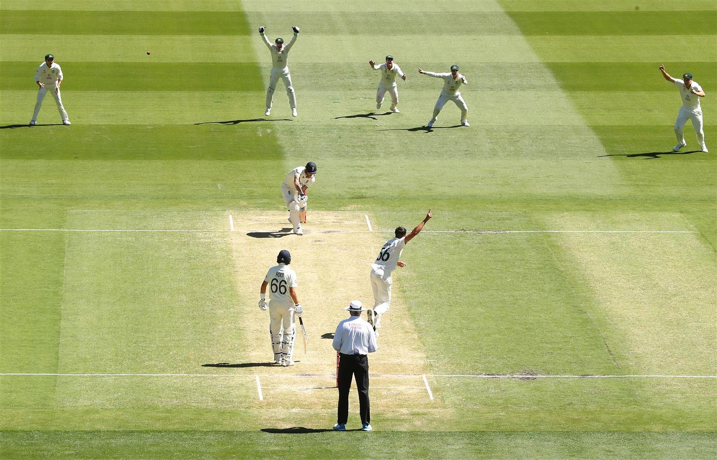 MELBOURNE, AUSTRALIA - DECEMBER 28: Mitchell Starc of Australia celebrates after bowling out Ben Stokes of England during day three of the Third Test match in the Ashes series between Australia and England at Melbourne Cricket Ground on December 28, 2021 in Melbourne, Australia. (Photo by Robert Cianflone/Getty Images)