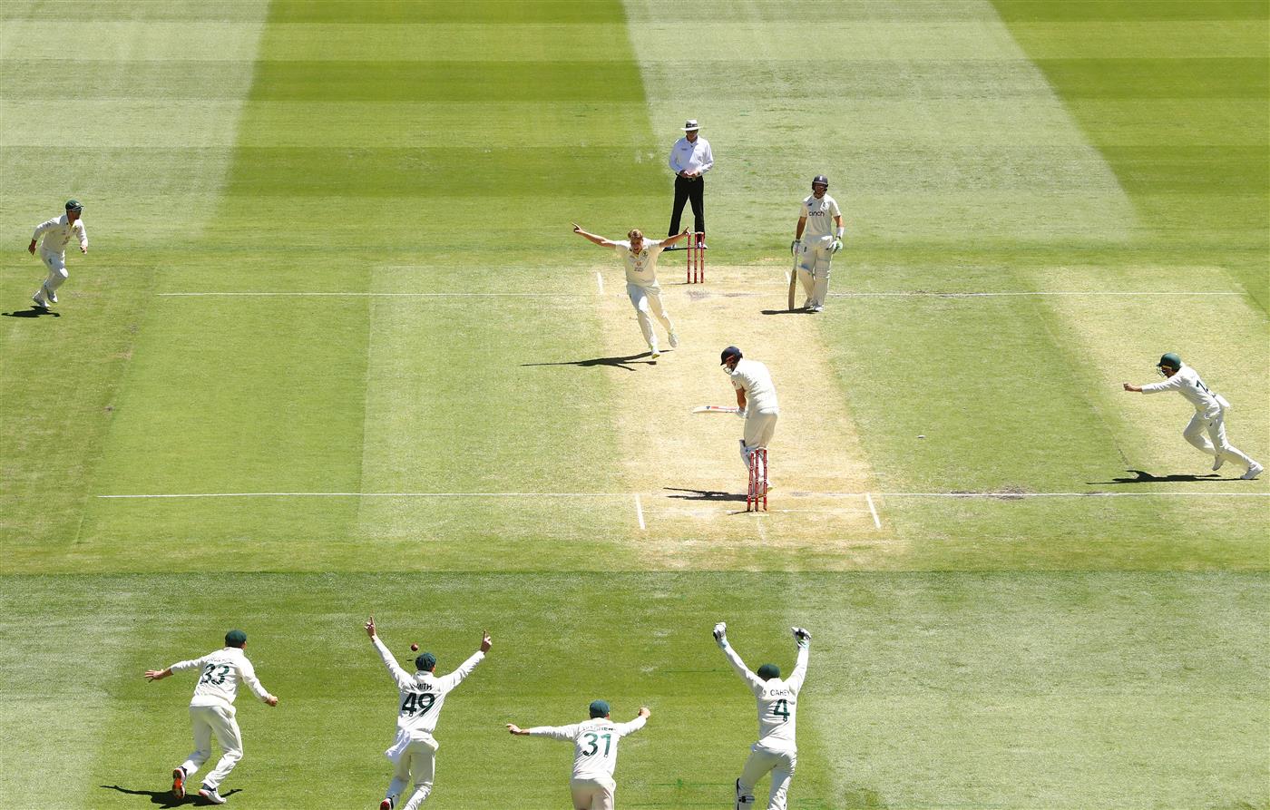 MELBOURNE, AUSTRALIA - DECEMBER 28: Cameron Green of Australia celebrates after dismissing James Anderson of England and retaining the Ashes during day three of the Third Test match in the Ashes series between Australia and England at Melbourne Cricket Ground on December 28, 2021 in Melbourne, Australia. (Photo by Robert Cianflone/Getty Images)