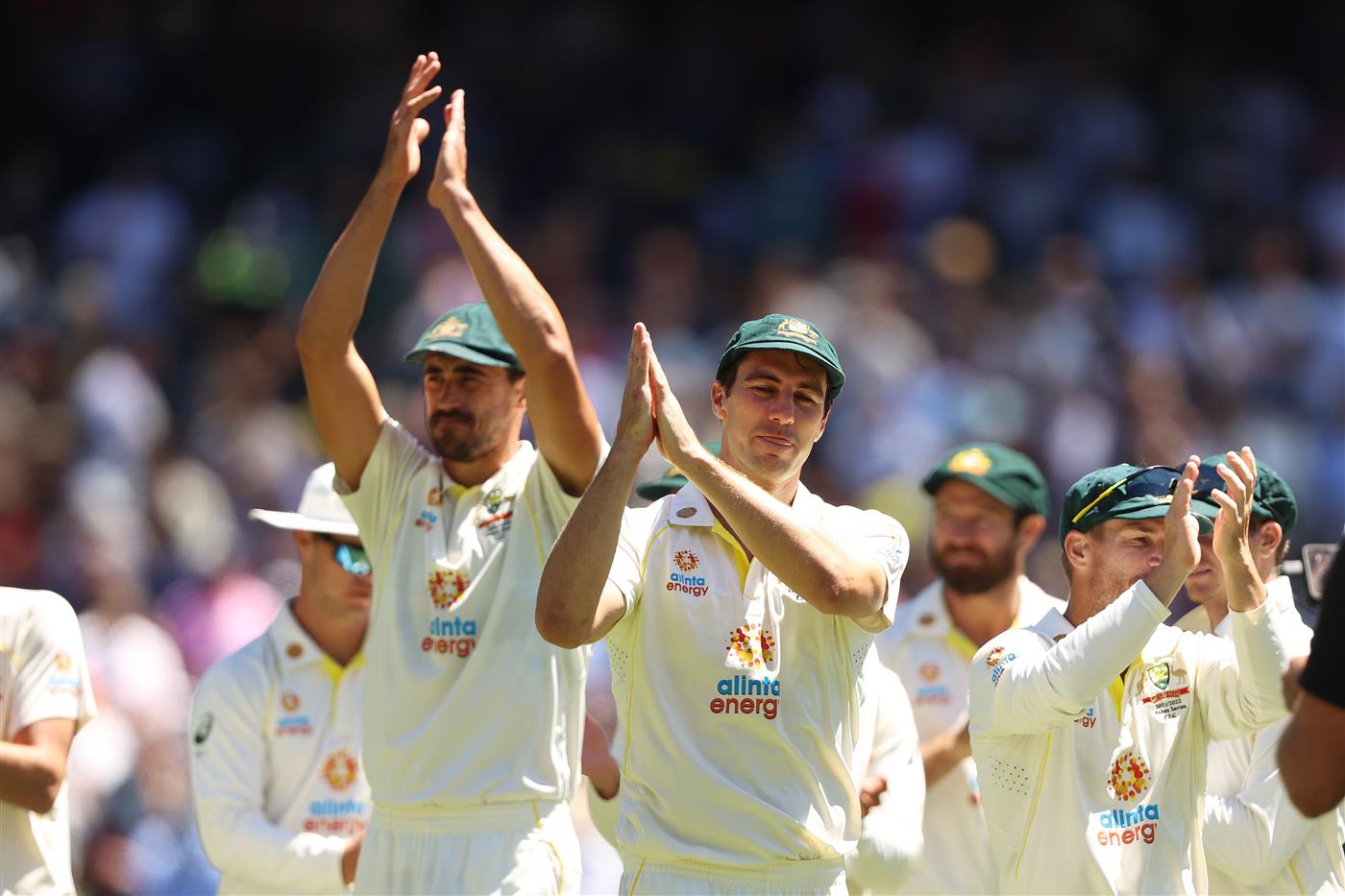 MELBOURNE, AUSTRALIA - DECEMBER 28: Pat Cummins (C)of Australia applauds with teammates after winning and retaining the Ashes on day three of the Third Test match in the Ashes series between Australia and England at Melbourne Cricket Ground on December 28, 2021 in Melbourne, Australia. (Photo by Robert Cianflone/Getty Images)