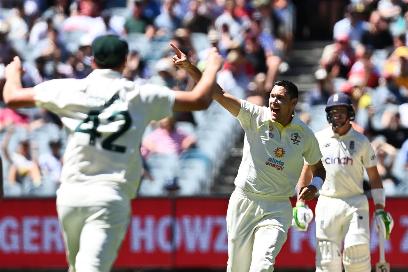 MELBOURNE, AUSTRALIA - DECEMBER 28: Scott Boland of Australia celebrates after dismissing Joe Root of England during day three of the Third Test match in the Ashes series between Australia and England at Melbourne Cricket Ground on December 28, 2021 in Melbourne, Australia. (Photo by Quinn Rooney/Getty Images)