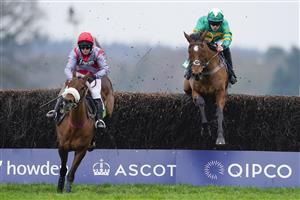 ASCOT, ENGLAND - JANUARY 22: Kevin Brogan riding Phoenix Way (green) clear the last to win The bet365 Handicap Chase from Lucy Turner and Fanion D'Estruval (L) at Ascot Racecourse on January 22, 2022 in Ascot, England. (Photo by Alan Crowhurst/Getty Images)