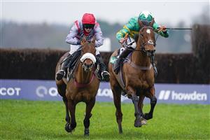 ASCOT, ENGLAND - JANUARY 22: Kevin Brogan riding Phoenix Way (green) clear the last to win The bet365 Handicap Chase from Lucy Turner and Fanion D'Estruval (L) at Ascot Racecourse on January 22, 2022 in Ascot, England. (Photo by Alan Crowhurst/Getty Images)