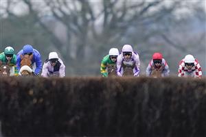 ASCOT, ENGLAND - JANUARY 22: A general view as runners approach a fence during The bet365 Handicap Chase at Ascot Racecourse on January 22, 2022 in Ascot, England. (Photo by Alan Crowhurst/Getty Images)