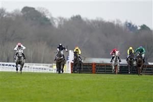 ASCOT, ENGLAND - JANUARY 22: Harry Skelton riding Unexpected Party (L) clear the last to win The SBK Holloway's Handicap Hurdle at Ascot Racecourse on January 22, 2022 in Ascot, England. (Photo by Alan Crowhurst/Getty Images)