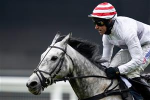 ASCOT, ENGLAND - JANUARY 22: Harry Skelton riding Unexpected Party clear the last to win The SBK Holloway's Handicap Hurdle at Ascot Racecourse on January 22, 2022 in Ascot, England. (Photo by Alan Crowhurst/Getty Images)