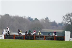 ASCOT, ENGLAND - JANUARY 22: Harry Skelton riding Unexpected Party (L) clear the last to win The SBK Holloway's Handicap Hurdle at Ascot Racecourse on January 22, 2022 in Ascot, England. (Photo by Alan Crowhurst/Getty Images)