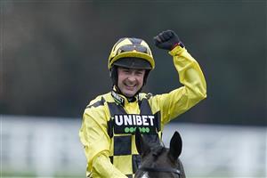 ASCOT, ENGLAND - JANUARY 22: A delighted Nico de Boinville after riding Shishkin to win The SBK Clarence House Chase at Ascot Racecourse on January 22, 2022 in Ascot, England. (Photo by Alan Crowhurst/Getty Images)