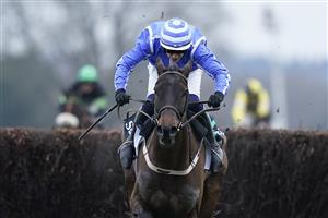 ASCOT, ENGLAND - JANUARY 22: Paul Townend riding Energumene in action during The SBK Clarence House Chase at Ascot Racecourse on January 22, 2022 in Ascot, England. (Photo by Alan Crowhurst/Getty Images)