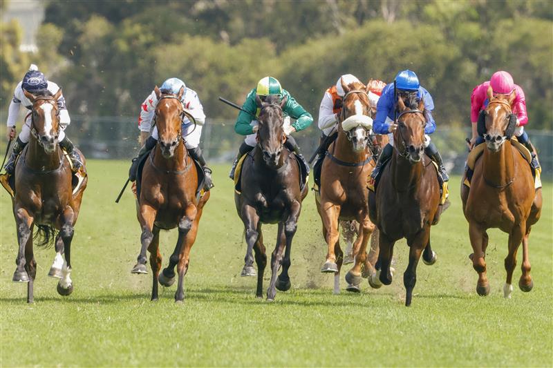 SYDNEY, AUSTRALIA - JANUARY 29: Tim Clark (L) on Overpass wins race 7 the XXXX Expressway Stakes during Sydney Racing at Rosehill Gardens on January 29, 2022 in Sydney, Australia. (Photo by Jenny Evans/Getty Images)