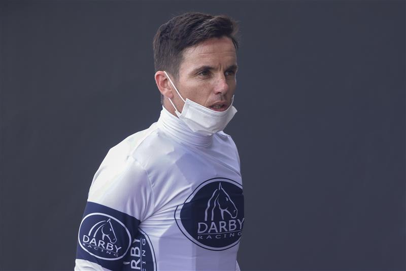 SYDNEY, AUSTRALIA - JANUARY 29: Tim Clark looks on after winning race 7 the XXXX Expressway Stakes on Overpass during Sydney Racing at Rosehill Gardens on January 29, 2022 in Sydney, Australia. (Photo by Jenny Evans/Getty Images)