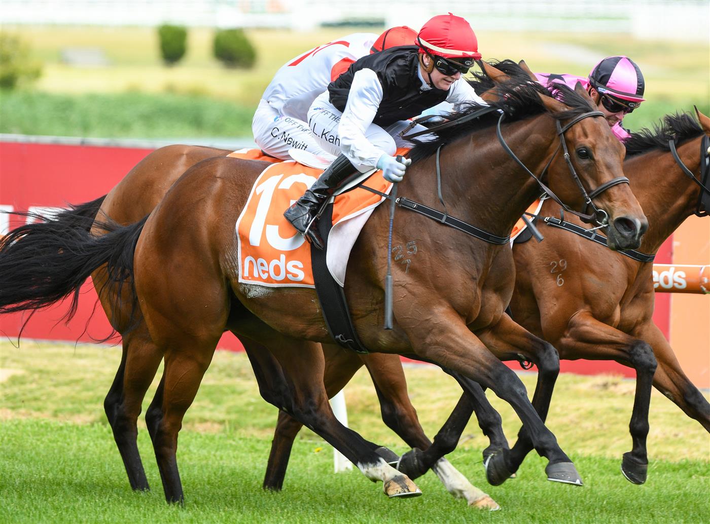 MELBOURNE, AUSTRALIA - DECEMBER 26: Jamie Kah riding Americain Angel winning  race 5,  the Ken Sturt Handicap, during Melbourne Racing at Caulfield Racecourse on December 26, 2021 in Melbourne, Australia. (Photo by Vince Caligiuri/Getty Images)