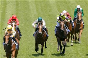SYDNEY, AUSTRALIA - JANUARY 29: Rachel King (yellow) on Queen Of The Ball wins race 3 the Widden Stakes during Sydney Racing at Rosehill Gardens on January 29, 2022 in Sydney, Australia. (Photo by Jenny Evans/Getty Images)