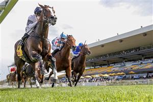 SYDNEY, AUSTRALIA - JANUARY 29: Tim Clark on Overpass wins race 7 the XXXX Expressway Stakes during Sydney Racing at Rosehill Gardens on January 29, 2022 in Sydney, Australia. (Photo by Jenny Evans/Getty Images)