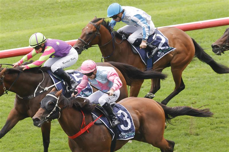 SYDNEY, AUSTRALIA - FEBRUARY 12: Reece Jones on Invincible Kiss wins race 4 the Midway Handicap  during Sydney Racing at Royal Randwick Racecourse on February 12, 2022 in Sydney, Australia. (Photo by Jenny Evans/Getty Images)