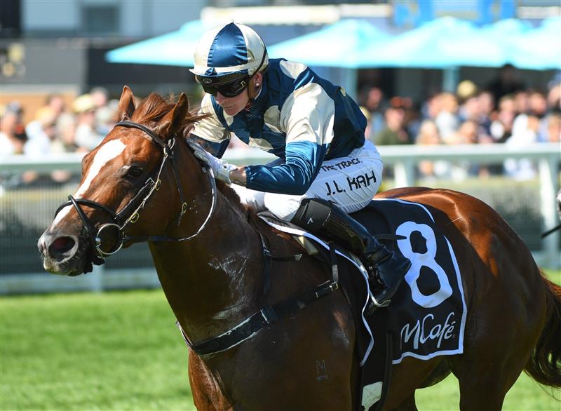 MELBOURNE, AUSTRALIA - FEBRUARY 12: Jamie Kah riding Marine One winning Race 7, the Mccafe Rubiton Stakes, during Melbourne Racing at Caulfield Racecourse on February 12, 2022 in Melbourne, Australia. (Photo by Vince Caligiuri/Getty Images)