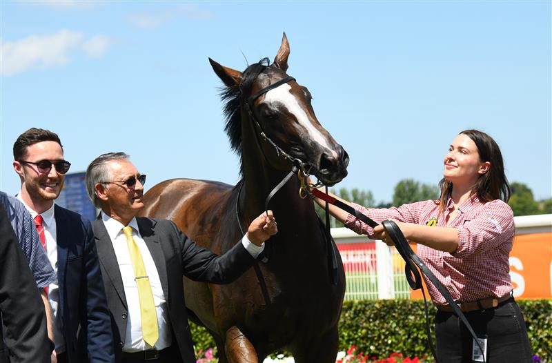 MELBOURNE, AUSTRALIA - FEBRUARY 12:  Trainer Peter Snowden poses with Revolutionary Miss after winning Race 4, the Neds Blue Diamond Prelude Fillies, during Melbourne Racing at Caulfield Racecourse on February 12, 2022 in Melbourne, Australia. (Photo by Vince Caligiuri/Getty Images)