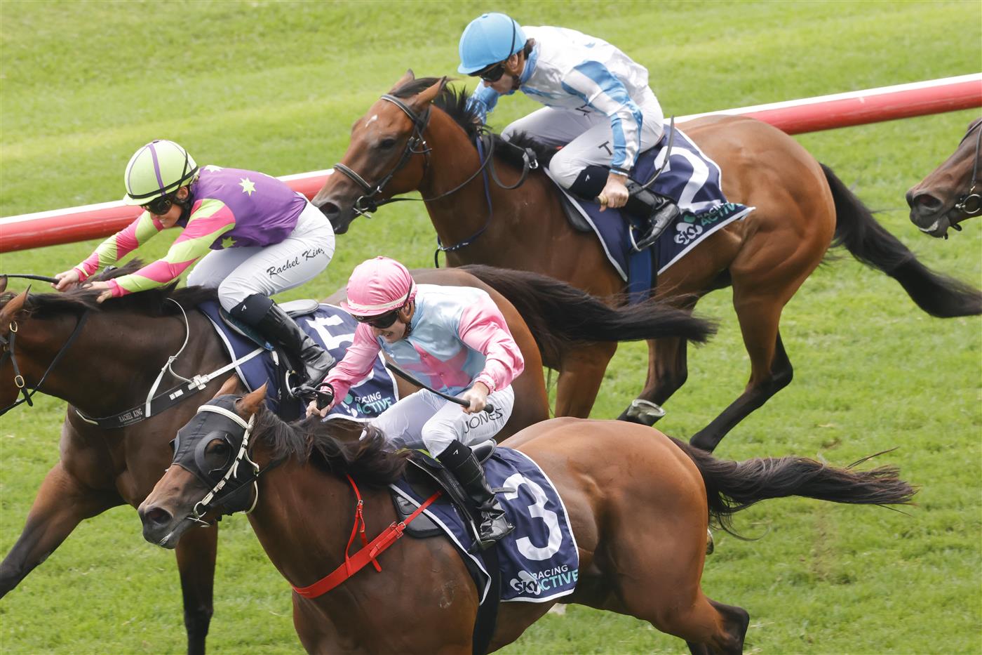 SYDNEY, AUSTRALIA - FEBRUARY 12: Reece Jones on Invincible Kiss wins race 4 the Midway Handicap  during Sydney Racing at Royal Randwick Racecourse on February 12, 2022 in Sydney, Australia. (Photo by Jenny Evans/Getty Images)