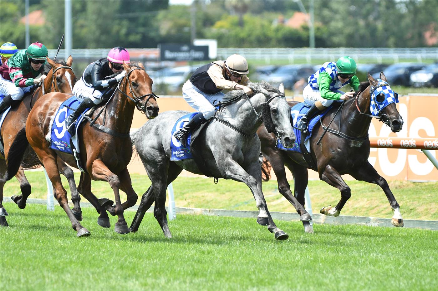MELBOURNE, AUSTRALIA - FEBRUARY 12: Jamie Kah riding Unanimous (L) winning Race 1, the The Big Screen Company Handicap, during Melbourne Racing at Caulfield Racecourse on February 12, 2022 in Melbourne, Australia. (Photo by Vince Caligiuri/Getty Images)