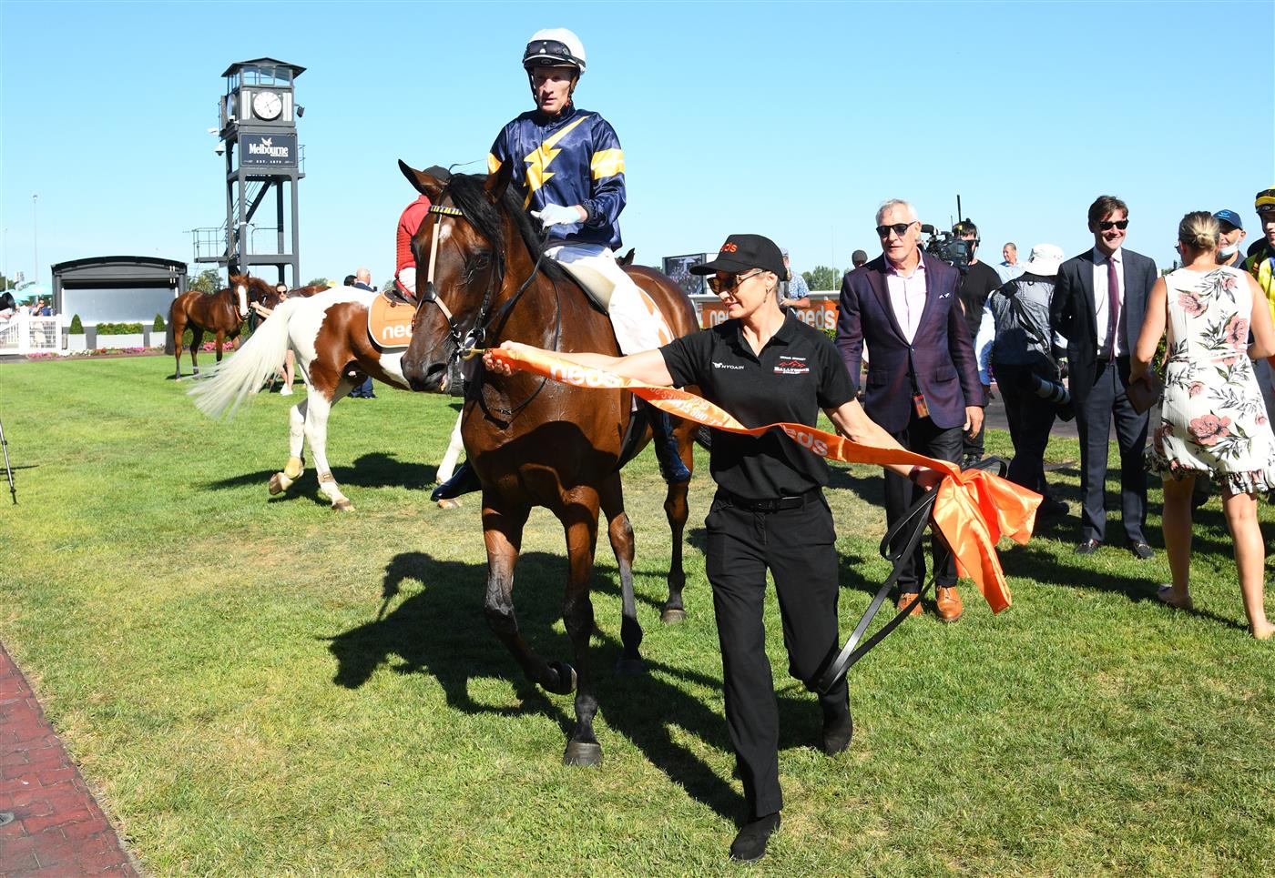 MELBOURNE, AUSTRALIA - FEBRUARY 12: Owner Rupert Legh alongside Mark Zahra riding Tofane after winning  Race 8, the Neds C.f. Orr Stakes, during Melbourne Racing at Caulfield Racecourse on February 12, 2022 in Melbourne, Australia. (Photo by Vince Caligiuri/Getty Images)