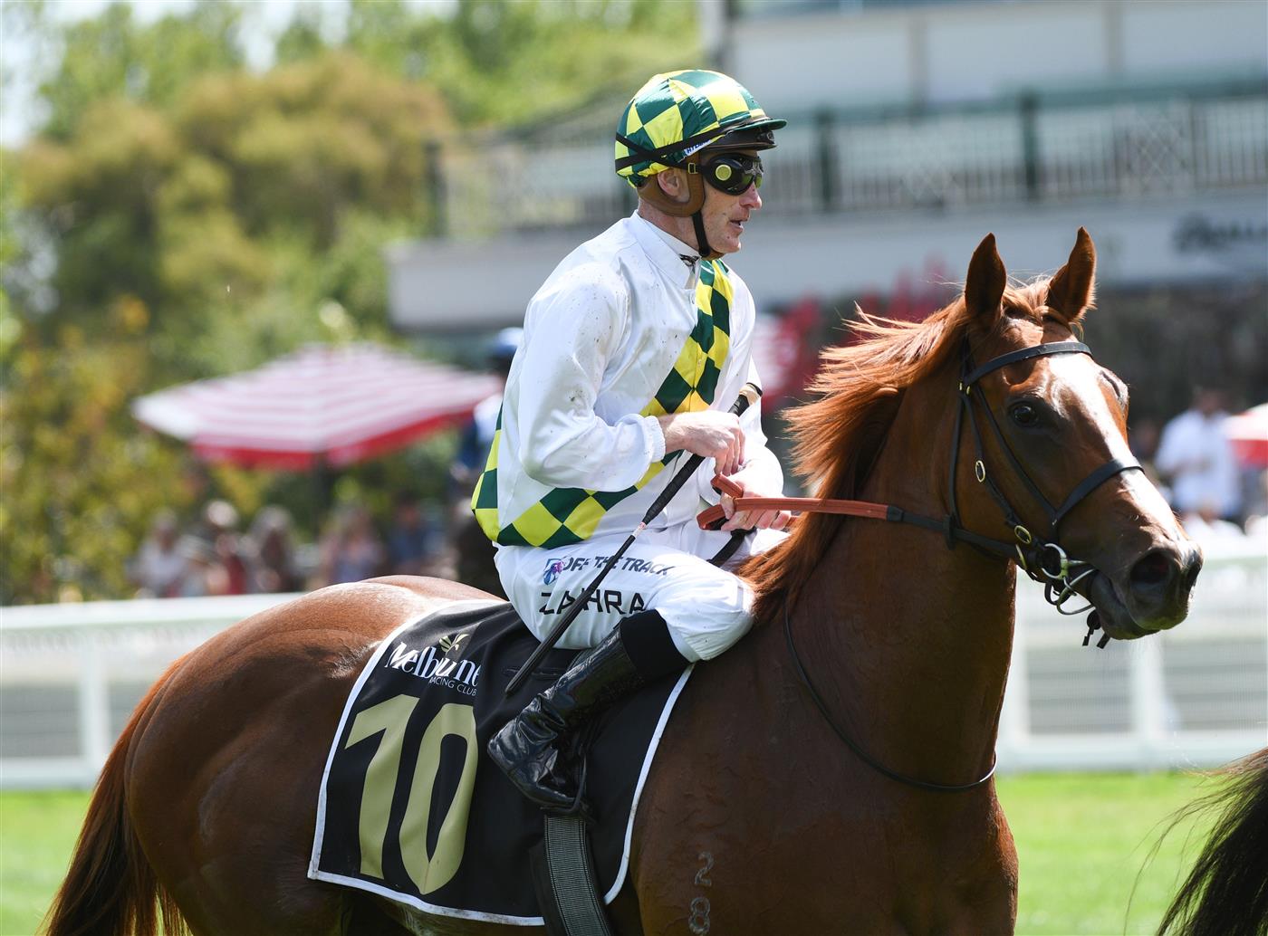MELBOURNE, AUSTRALIA - FEBRUARY 12: Mark Zahra riding Argentia after winning  race 5,  the Senet Kevin Hayes Stakes, during Melbourne Racing at Caulfield Racecourse on February 12, 2022 in Melbourne, Australia. (Photo by Vince Caligiuri/Getty Images)