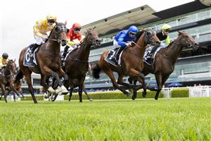 SYDNEY, AUSTRALIA - FEBRUARY 12: Sam Clipperton (green cap) on Mumbai Jewel wins race 1 the Coolmore Pierro Plate during Sydney Racing at Royal Randwick Racecourse on February 12, 2022 in Sydney, Australia. (Photo by Jenny Evans/Getty Images)