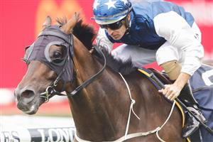SYDNEY, AUSTRALIA - FEBRUARY 12: Hugh Bowman on Outlandos wins wins race 3 the Bisley Workwear Handicap during Sydney Racing at Royal Randwick Racecourse on February 12, 2022 in Sydney, Australia. (Photo by Jenny Evans/Getty Images)