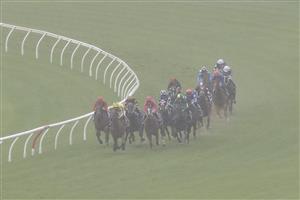 SYDNEY, AUSTRALIA - FEBRUARY 12: James McDonald (yellow) on Snap Dancer wins race 9 the Robrick Lodge Triscay Stakes during Sydney Racing at Royal Randwick Racecourse on February 12, 2022 in Sydney, Australia. (Photo by Jenny Evans/Getty Images)