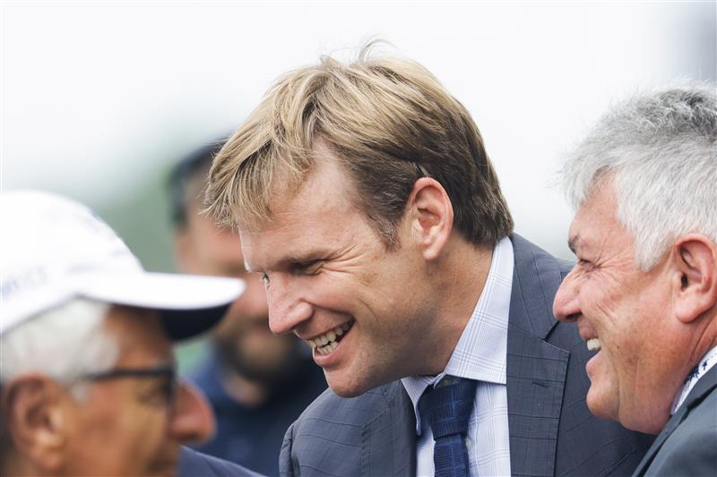 SYDNEY, AUSTRALIA - FEBRUARY 19: Trainer Bjorn Baker smiles after winning race 2 the Schweppes Handicap on Rule of Law  during Sydney Racing at Rosehill Gardens on February 19, 2022 in Sydney, Australia. (Photo by Jenny Evans/Getty Images)
