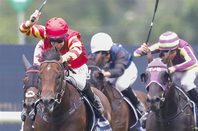 SYDNEY, AUSTRALIA - FEBRUARY 19: Tommy Berry (red) on Military expert wins the Midway Handicap during Sydney Racing at Rosehill Gardens on February 19, 2022 in Sydney, Australia. (Photo by Jenny Evans/Getty Images)