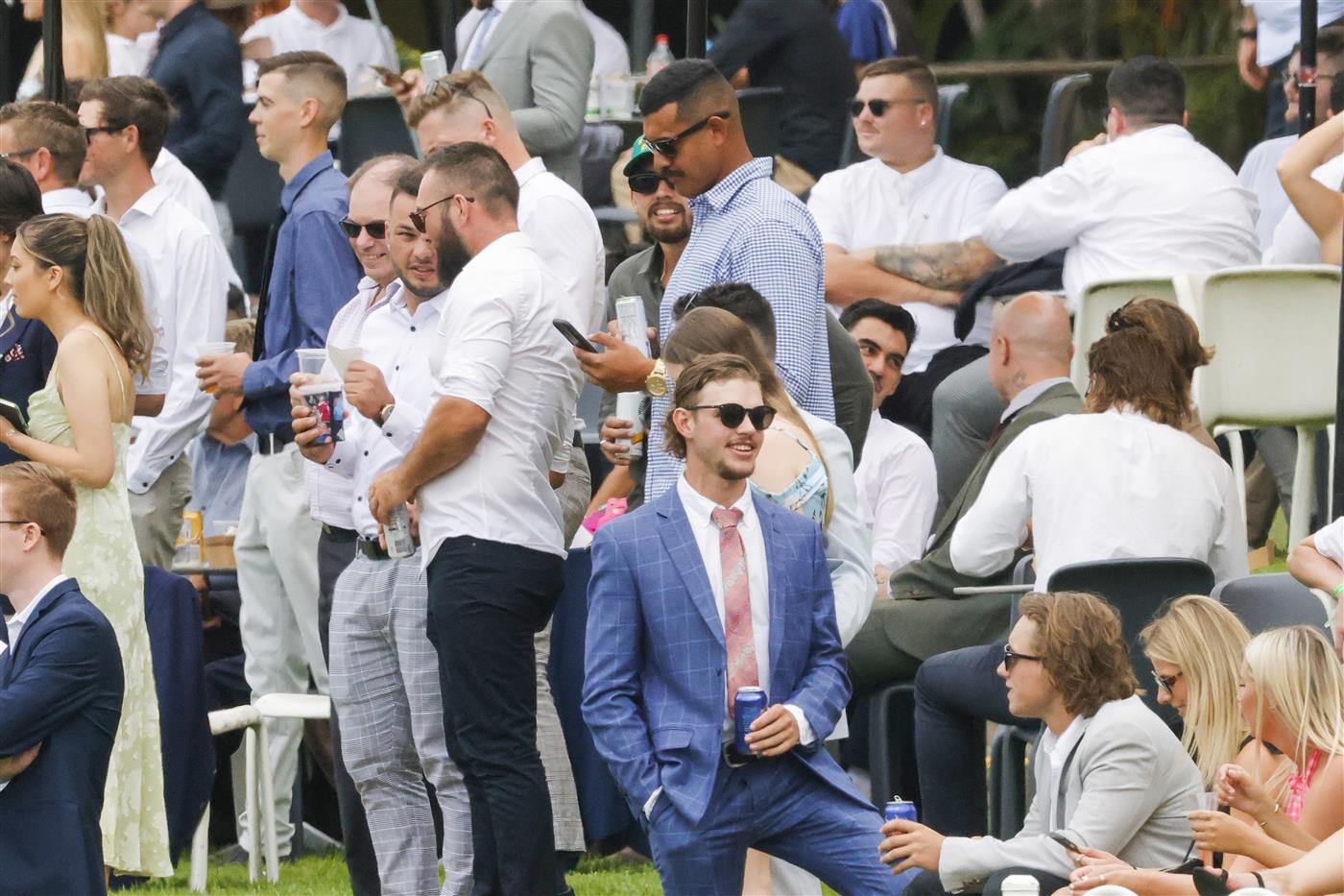 SYDNEY, AUSTRALIA - FEBRUARY 19: Race goers are seen  during Sydney Racing at Rosehill Gardens on February 19, 2022 in Sydney, Australia. (Photo by Jenny Evans/Getty Images)