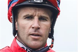 SYDNEY, AUSTRALIA - FEBRUARY 19: Tommy Berry looks on after winning the Midway Handicap on Military Expert during Sydney Racing at Rosehill Gardens on February 19, 2022 in Sydney, Australia. (Photo by Jenny Evans/Getty Images)