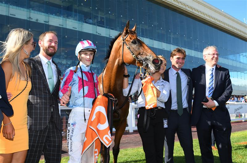 MELBOURNE, AUSTRALIA - FEBRUARY 26: Trainers Ciaron Maher and David Eustace pose with Ben Allen after Marabi won Race 8,  the Neds Oakleigh Plate, during Melbourne Racing at Caulfield Racecourse on February 26, 2022 in Melbourne, Australia. (Photo by Vince Caligiuri/Getty Images)