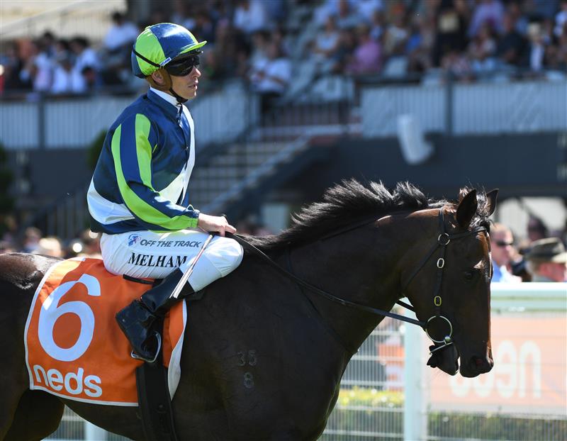 MELBOURNE, AUSTRALIA - FEBRUARY 26: Ben Melham after riding Lavish Girl to win Race 4, the Neds Angus Armanasco Stakes, during Melbourne Racing at Caulfield Racecourse on February 26, 2022 in Melbourne, Australia. (Photo by Vince Caligiuri/Getty Images)