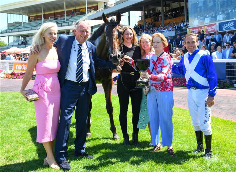 MELBOURNE, AUSTRALIA - FEBRUARY 26: Damien Oliver poses with trainer Gai Waterhouse and owner John Singleton after riding Castlereagh Kid winning Race 3, the Stow Storage Solutions Autumn Classic, during Melbourne Racing at Caulfield Racecourse on February 26, 2022 in Melbourne, Australia. (Photo by Vince Caligiuri/Getty Images)
