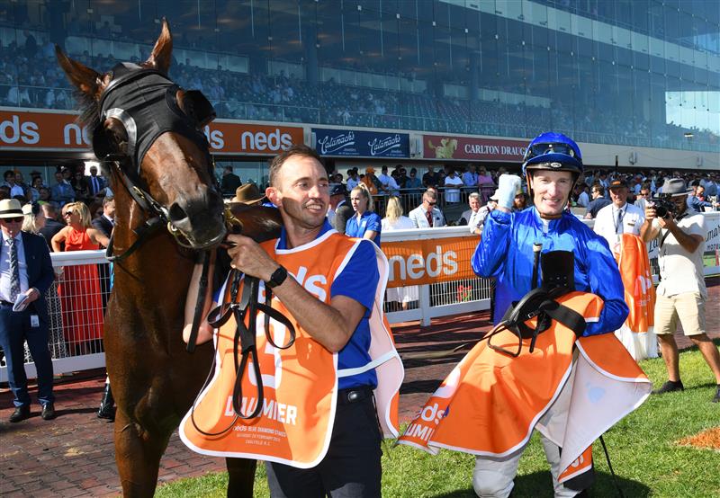 MELBOURNE, AUSTRALIA - FEBRUARY 26: Mark Zahra riding Daumier after winning Race 7, the Neds Blue Diamond Stakes,  during Melbourne Racing at Caulfield Racecourse on February 26, 2022 in Melbourne, Australia. (Photo by Vince Caligiuri/Getty Images)