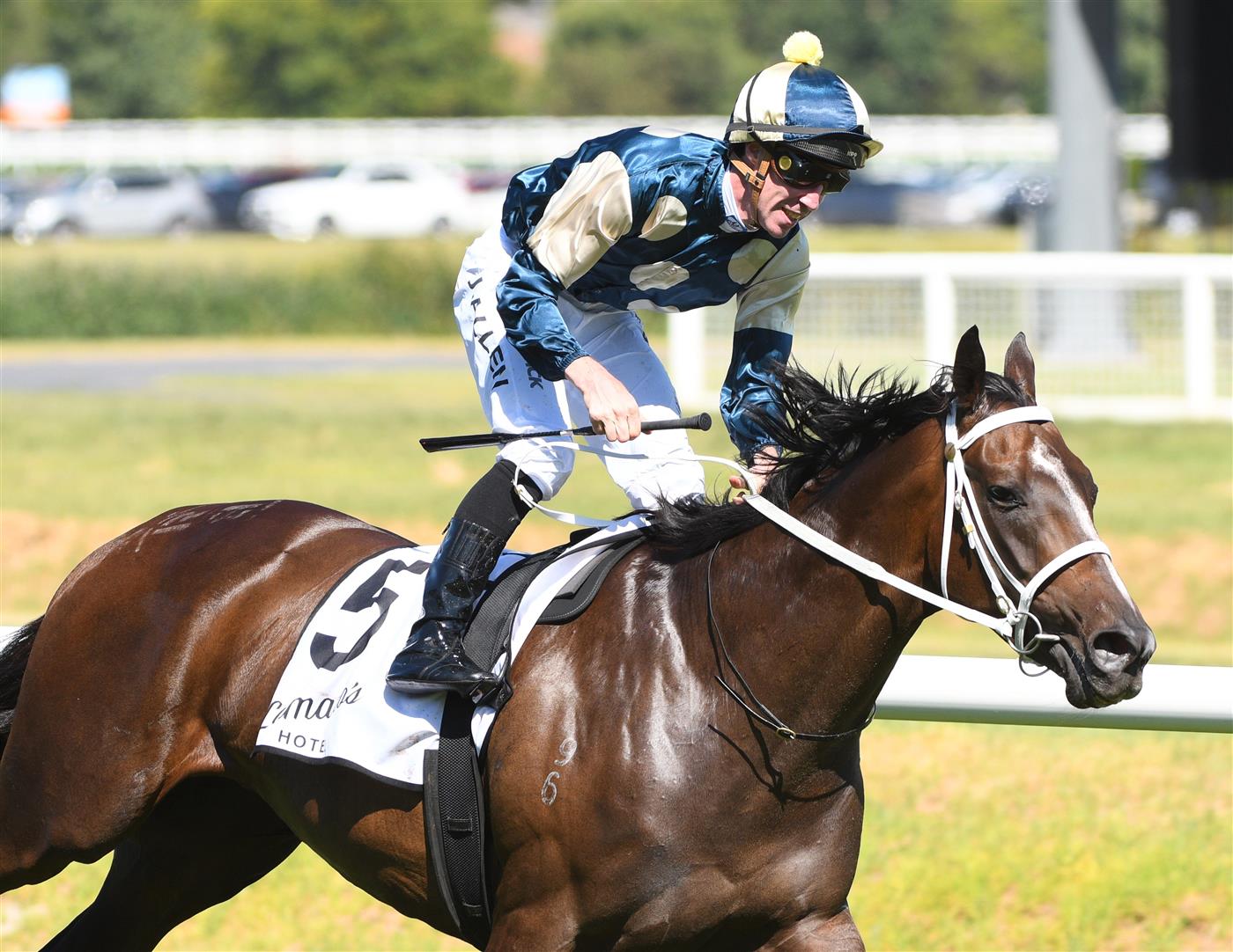 MELBOURNE, AUSTRALIA - FEBRUARY 26: John Allen riding Sierra Sue winning Race 6, the Lamaro's Hotel Futurity Stakes, during Melbourne Racing at Caulfield Racecourse on February 26, 2022 in Melbourne, Australia. (Photo by Vince Caligiuri/Getty Images)