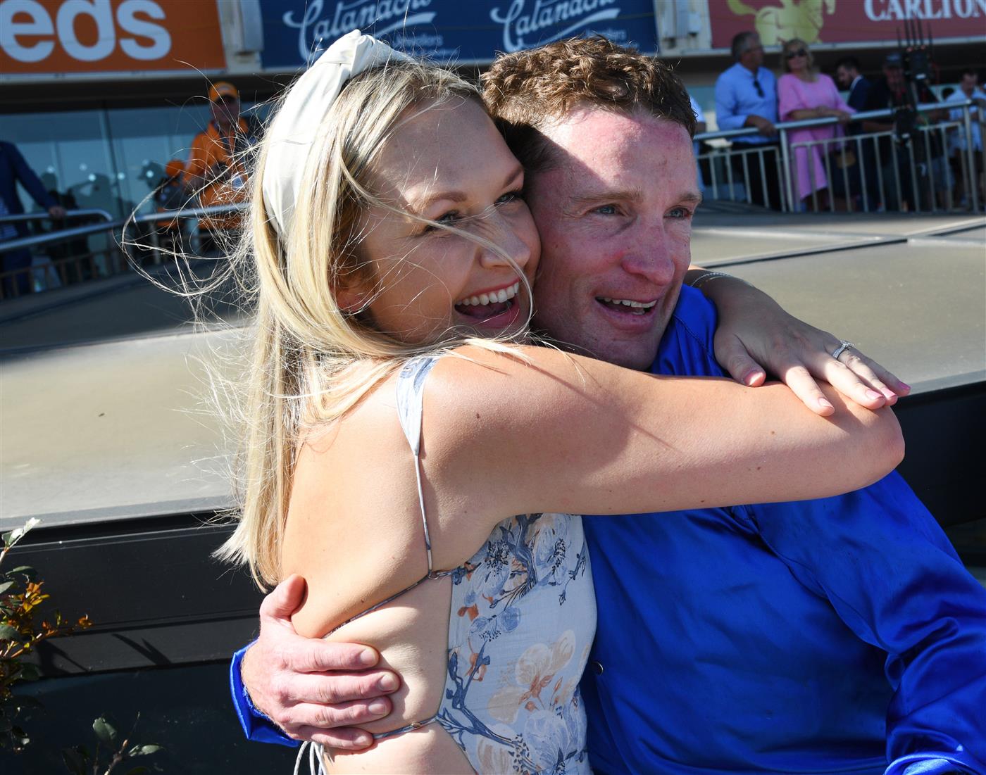 MELBOURNE, AUSTRALIA - FEBRUARY 26: Mark Zahra is congratulated by wife Elyse Zahra after riding Daumier to win Race 7, the Neds Blue Diamond Stakes,  during Melbourne Racing at Caulfield Racecourse on February 26, 2022 in Melbourne, Australia. (Photo by Vince Caligiuri/Getty Images)