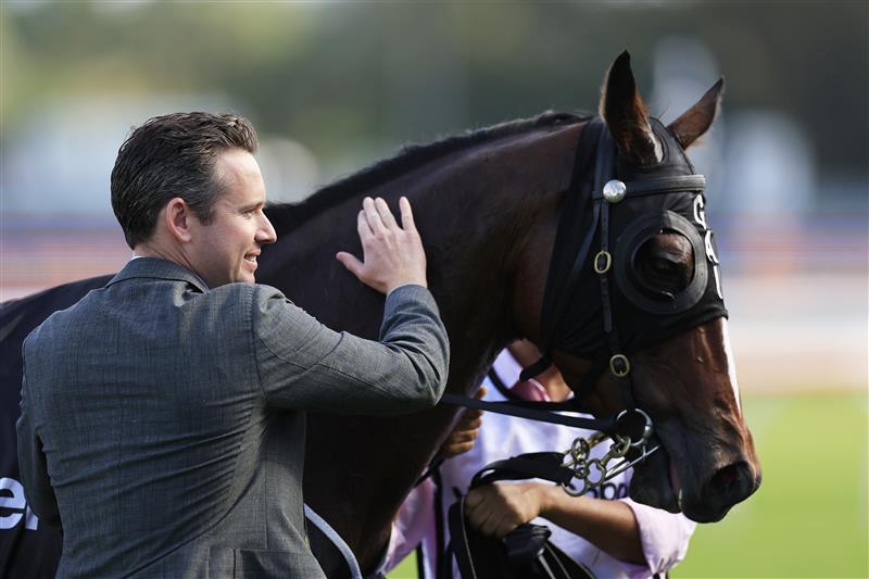 SYDNEY, AUSTRALIA - MARCH 05: Adrian Bott with Converge after winning race 8 the Mostyn Copper Randwick Guineas during Sydney Racing at Royal Randwick Racecourse on March 05, 2022 in Sydney, Australia. (Photo by Mark Evans/Getty Images)