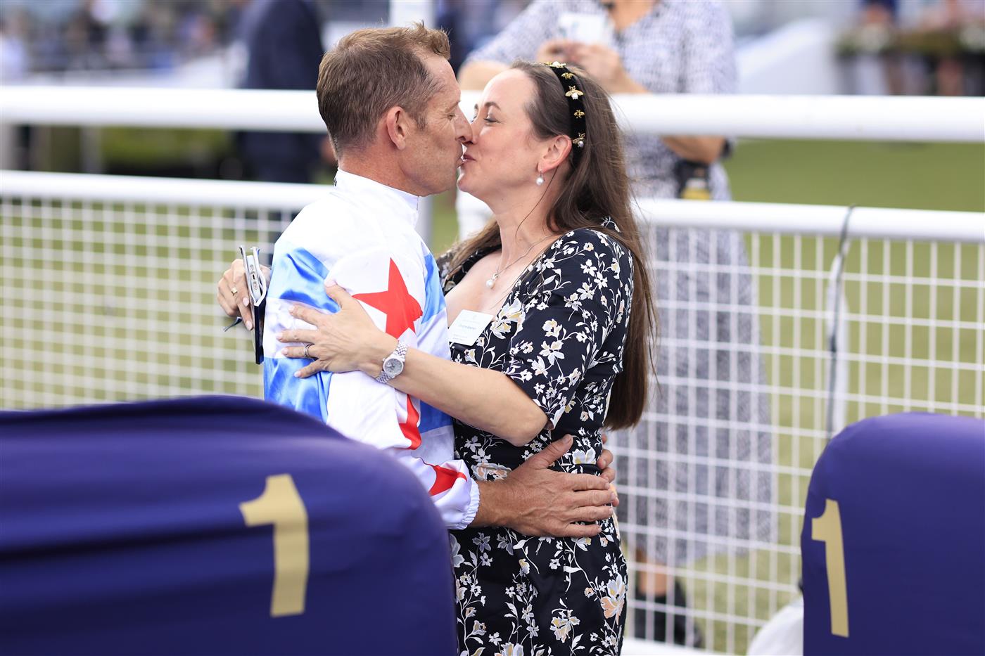 SYDNEY, AUSTRALIA - MARCH 05: Hugh Bowman hugs wife Christine after winning race 7 the Furphy Canterbury Stakes on Forbidden Love  during Sydney Racing at Royal Randwick Racecourse on March 05, 2022 in Sydney, Australia. (Photo by Mark Evans/Getty Images)