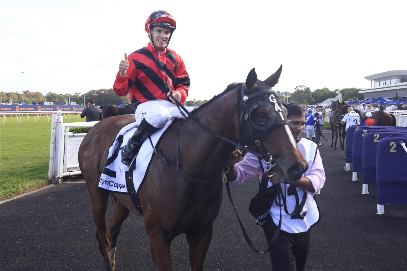 SYDNEY, AUSTRALIA - MARCH 05: Tim Clark on Converge returns to scale after winning race 8 the Mostyn Copper Randwick Guineas during Sydney Racing at Royal Randwick Racecourse on March 05, 2022 in Sydney, Australia. (Photo by Mark Evans/Getty Images)