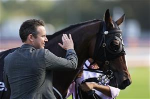 SYDNEY, AUSTRALIA - MARCH 05: Adrian Bott with Converge after winning race 8 the Mostyn Copper Randwick Guineas during Sydney Racing at Royal Randwick Racecourse on March 05, 2022 in Sydney, Australia. (Photo by Mark Evans/Getty Images)