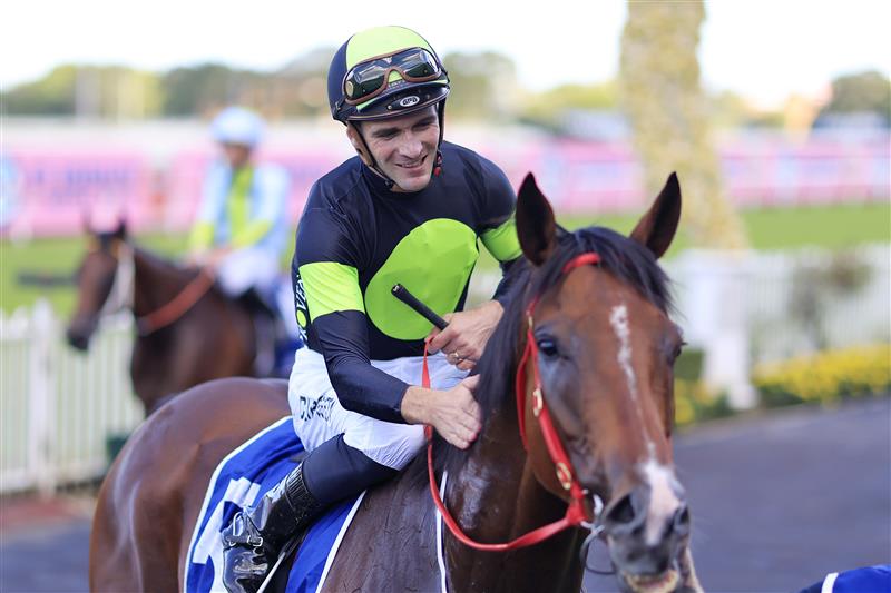 SYDNEY, AUSTRALIA - MARCH 12: Sam Clipperton on Stockman returns to scale after winning race 7 the Furphy Sky High Stakes during Sydney Racing Chandon Ladies Day at Rosehill Gardens on March 12, 2022 in Sydney, Australia. (Photo by Mark Evans/Getty Images)