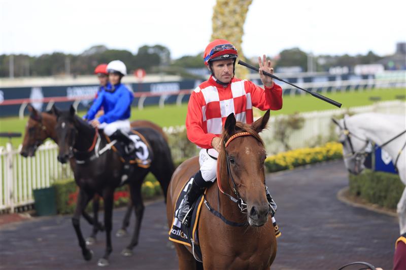 SYDNEY, AUSTRALIA - MARCH 12: Tommy Berry on She's Extreme wins Race 2 the Cellarbrations Magic Night Stakes during Sydney Racing Chandon Ladies Day at Rosehill Gardens on March 12, 2022 in Sydney, Australia. (Photo by Mark Evans/Getty Images)