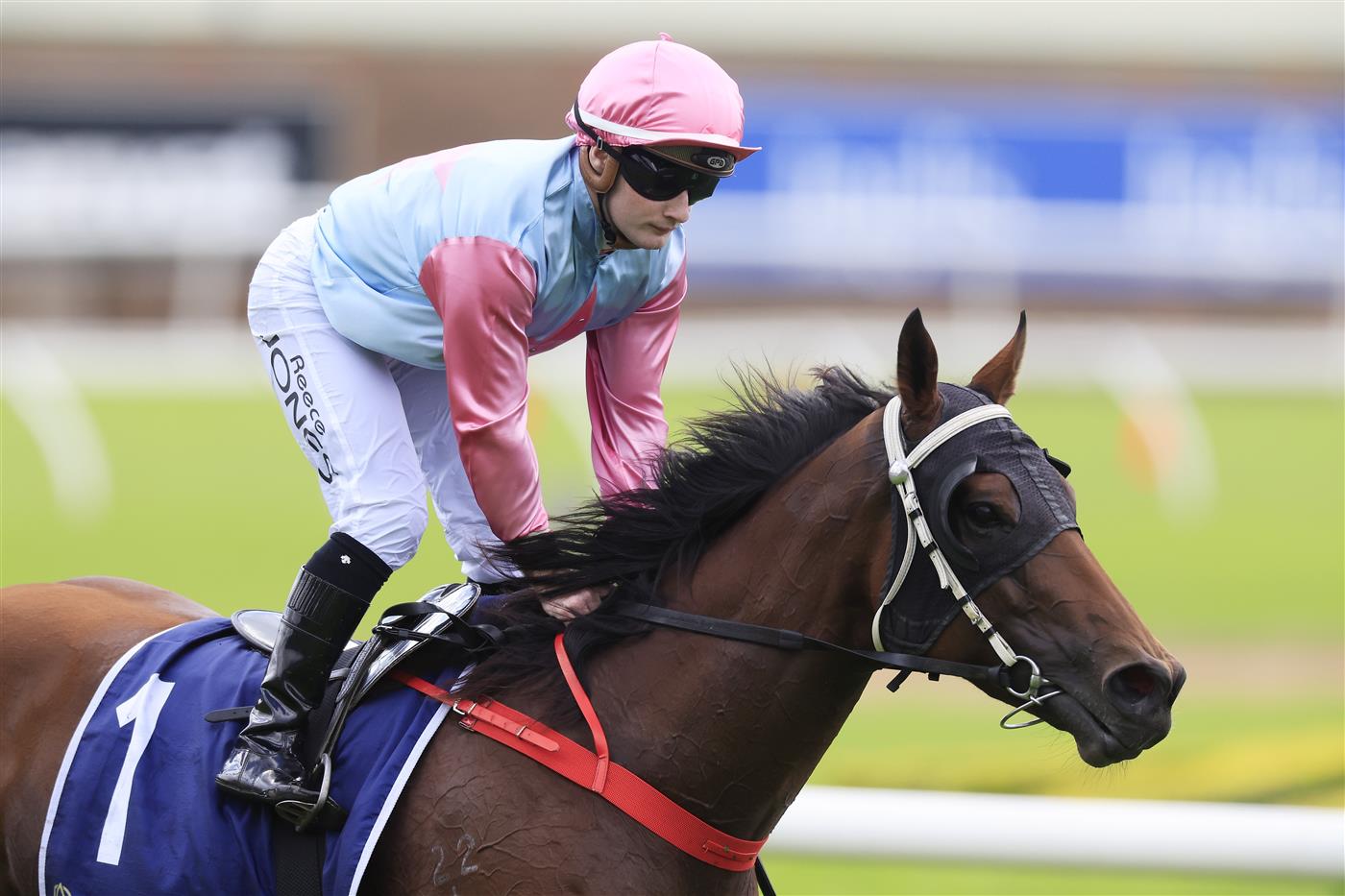 SYDNEY, AUSTRALIA - MARCH 12: Reece Jones on Invincible Kiss returns to scale after winning race 1 the Midway Handicap during Sydney Racing Chandon Ladies Day at Rosehill Gardens on March 12, 2022 in Sydney, Australia. (Photo by Mark Evans/Getty Images)