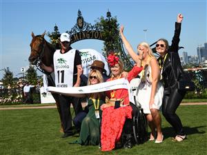 MELBOURNE, AUSTRALIA - MARCH 12: Connections after Roch 'N' Horse won the Yulong Stud Newmarket Handicap, during Melbourne Racing at Flemington Racecourse on March 12, 2022 in Melbourne, Australia. (Photo by Vince Caligiuri/Getty Images)