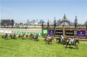 MELBOURNE, AUSTRALIA - MARCH 12: Josh Parr riding Duais defeat Think it Over and Spanish Mission in Race 7, the Tab Australian Cup, during Melbourne Racing at Flemington Racecourse on March 12, 2022 in Melbourne, Australia. (Photo by Vince Caligiuri/Getty Images)