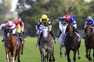 SYDNEY, AUSTRALIA - MARCH 12: Jason Collett on Lighthouse wins race 8 the Coolmore Classic during Sydney Racing Chandon Ladies Day at Rosehill Gardens on March 12, 2022 in Sydney, Australia. (Photo by Mark Evans/Getty Images)