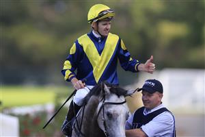 SYDNEY, AUSTRALIA - MARCH 12: Jason Collett on Lighthouse returns to scale after winning race 8 the Coolmore Classic during Sydney Racing Chandon Ladies Day at Rosehill Gardens on March 12, 2022 in Sydney, Australia. (Photo by Mark Evans/Getty Images)